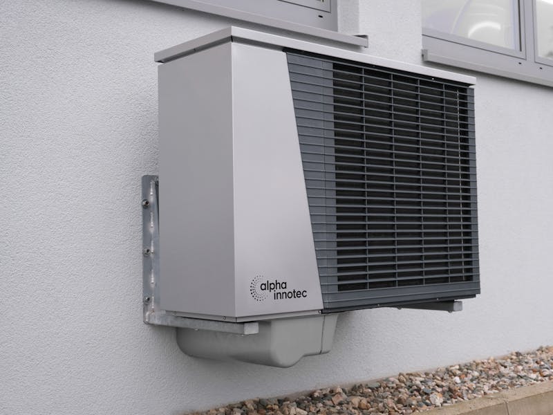 Residential AC condenser installation in Auburn GA