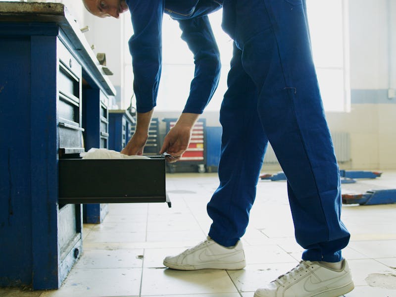 Service technician with tools ready for commercial HVAC repair